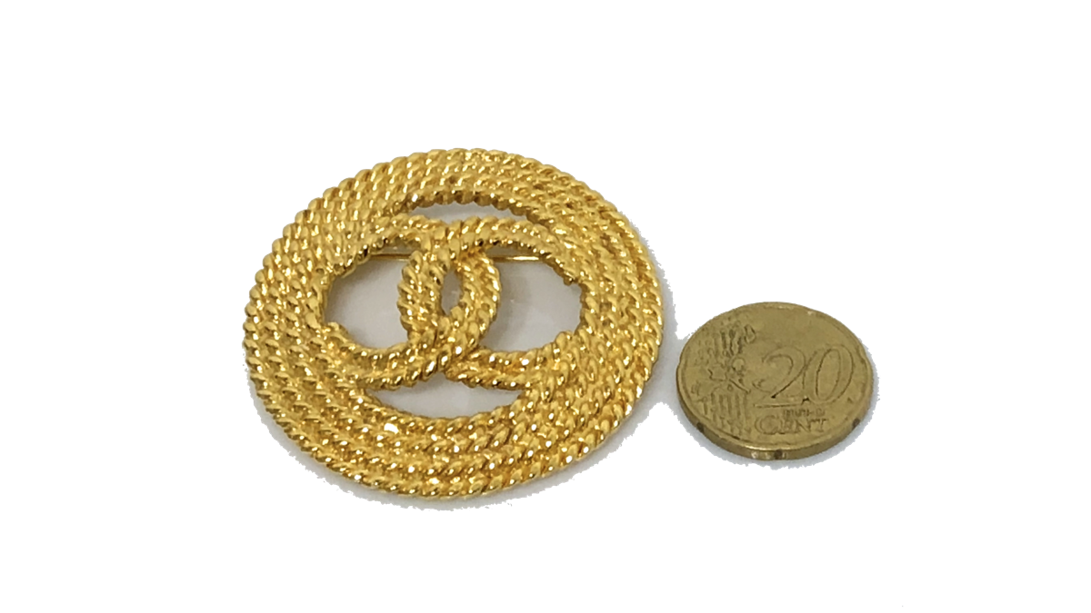 Broche CHANEL Metal Dorado