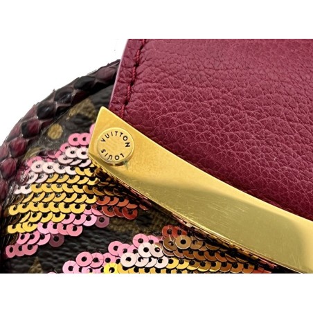Clutch LOUIS VUITTON Sequins Savage Cub